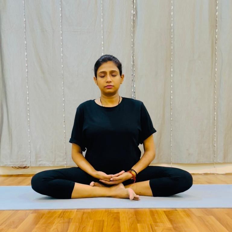 Hands resting in Bhairava mudra